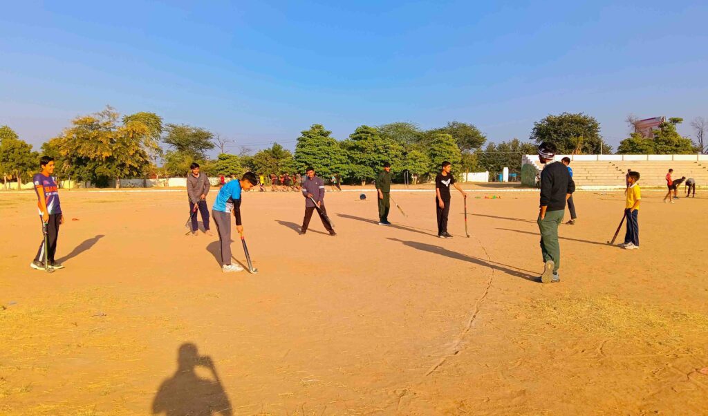 Wide view of Sikar District Stadium in Rajasthan with running track and sports ground